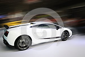 White car motion blur