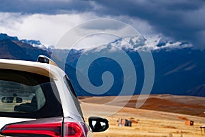 White car in mountanious Peru