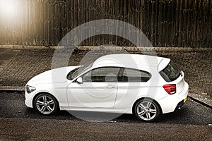 White car parked in the street