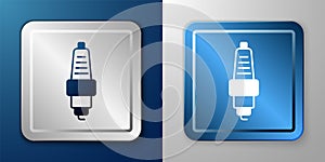White Car spark plug icon isolated on blue and grey background. Car electric candle. Silver and blue square button