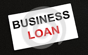 White card on the black background with text Business Loan photo