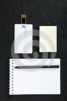 White card. Office desk wooden background top view mock up