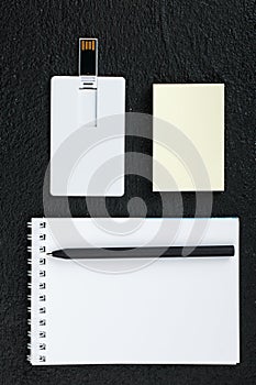 White card. Office desk wooden background top view mock up