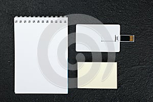 White card. Office desk wooden background top view mock up