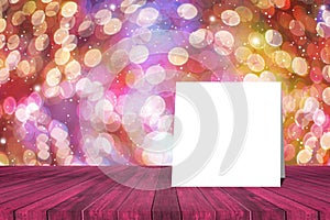 White card put on table and blurred bokeh out of focus in night light background.product display template.Business presentation