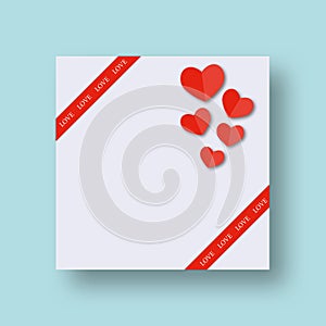 White card with red hearts on blue background. Greeting card for Valentine or Wedding.