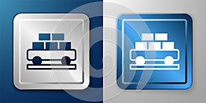 White Cargo train wagon icon isolated on blue and grey background. Full freight car. Railroad transportation. Silver and