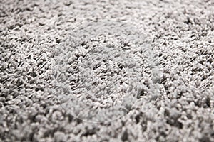 White carpet background texture, close up, gray textile texture, fluffy rug background, Wool fabric texture, beige hairy