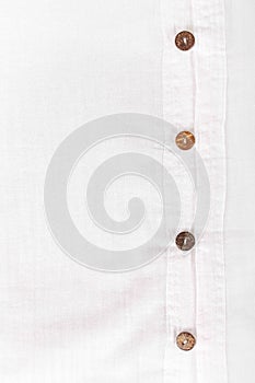 White casual shirt with the coconut shell button