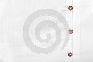 White casual shirt with the coconut shell button