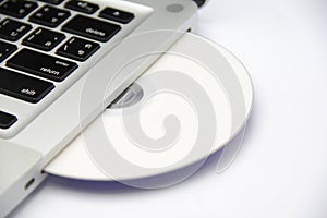 White cd or dvd disk in laptop