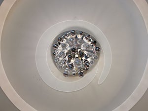 White ceiling with many light bulbs