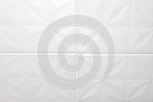 White ceiling tiles made of expanded polystyrene.