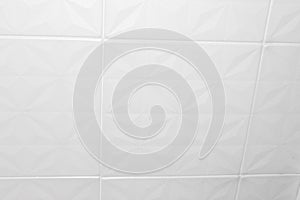 White ceiling tiles made of expanded polystyrene.