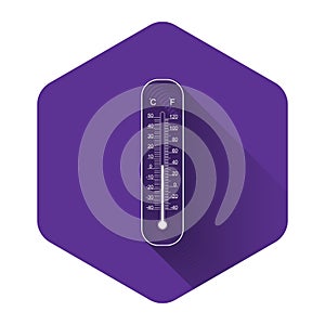 White Celsius and fahrenheit meteorology thermometers measuring heat and cold icon with long shadow. Thermometer