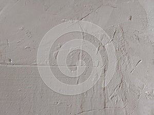 white cement wall background with stratched