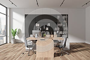 White CEO office with bookcase and table