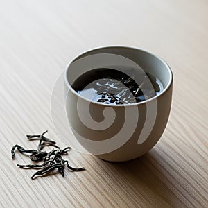 Is minimalistic, emphasizing the simplicity and natural texture of