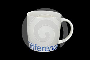 White ceramic mug silkscreen word difference, isolated on black background