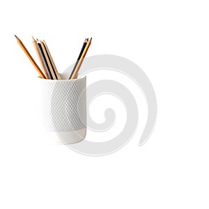 White ceramic pencil holder with sharpened pencils container