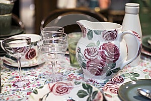 White ceramic plates on a shelf in a store