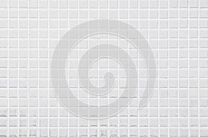 White ceramic wall and floor tiles mosaic background in bathroom and kitchen. Design pattern geometric with grid wallpaper texture