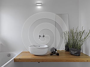 White ceramic washbasin in bathroom photo