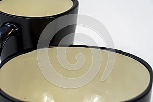 white ceramics bowl isolated on white background. plates and bowls arranged black color the frets