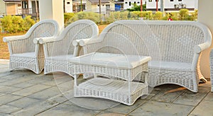 White chair made of rattan.