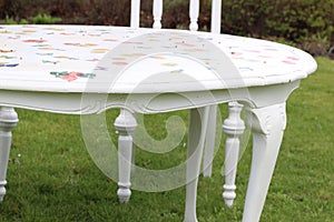 White Chair and Table in The Garden. photo