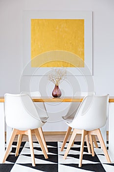 White chairs in dining room