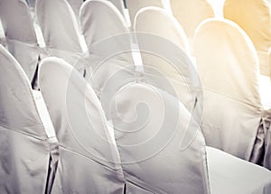 White chairs for the event or wedding reception party.