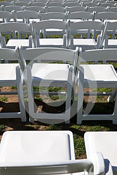 White chairs for outdoor event