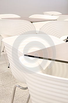 White chairs with tables photo