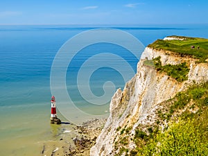 White chalk cliffs and Beachy Head Lighthouse, Eastbourne, East Sussex, England