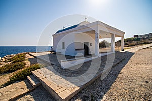 White chapel on a cliffs of Kavo Greko near Aiya Napa, Cyprus