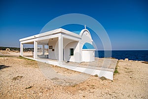 White chapel on a cliffs of Kavo Greko near Aiya Napa, Cyprus