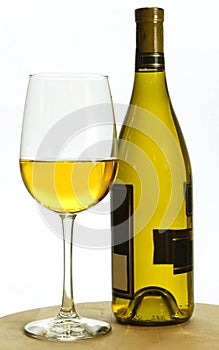 White chardonnay wine bottle and glass