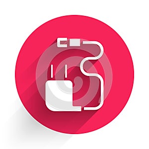 White Charger icon isolated with long shadow. Red circle button. Vector Illustration