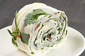 White cheese (brynza) roll with vegetables