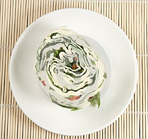 White cheese (brynza) roll with vegetables