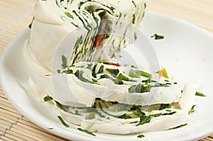 White cheese (brynza) roll with vegetables