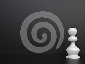 White chess pawn in front of  black background