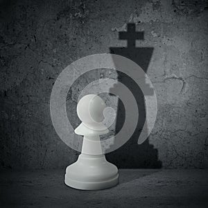 White chess pawn with shadow queen photo