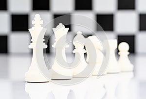 white chess pieces on chessboard, Set of chess figures on white background