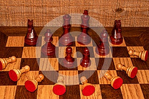 White chess pieces in submission position on the board