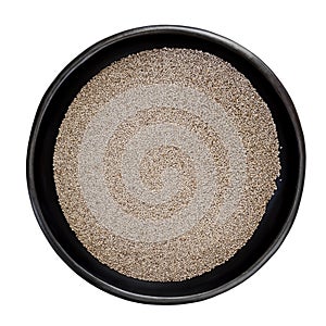 White Chia Seeds in Black Bowl Top View Isolated