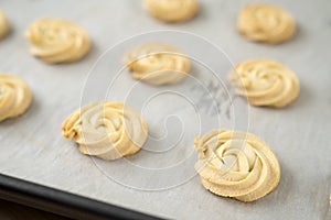 White chocolate cookies in baking tray