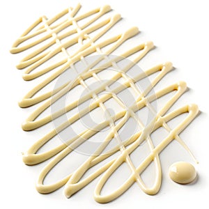 White chocolate drizzles isolated on white background