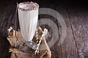 White chocolate milkshake in tall glass